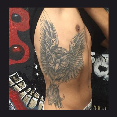 mage of Owl Tattoos on ribcage side