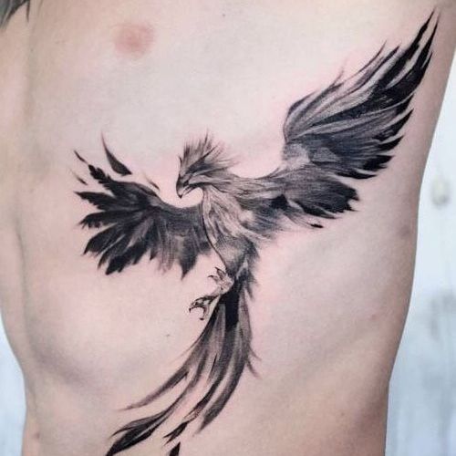 Phoenix tattoo on ribcage/side